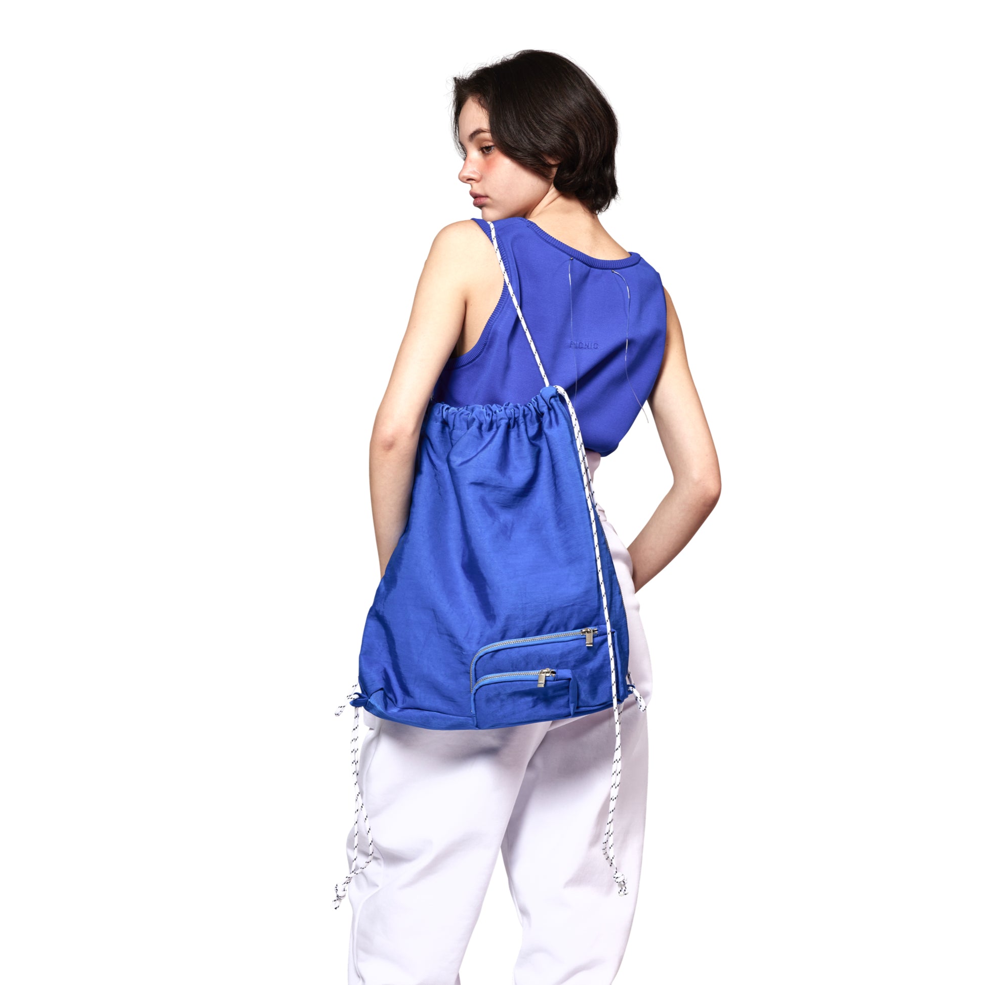 SPACE SUIT KNAPSACK in blue by AYA. Unisex bag made in Japan.